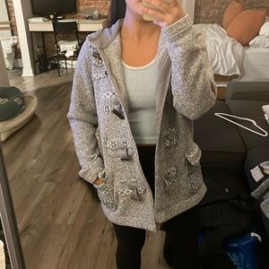 Small grey Patagonia jacket with hood